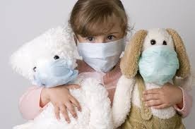 Mouldillness Mycotoxins building forensics child holding two teddy bear & wearing mask